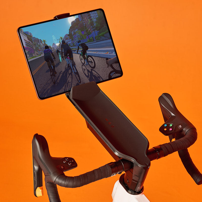 Tablet HolderKeep the immersive world of Zwift and the excitement front and center with the Zwift Ride Tablet Holder that works seamlessly with Zwift Ride—only $49.99.